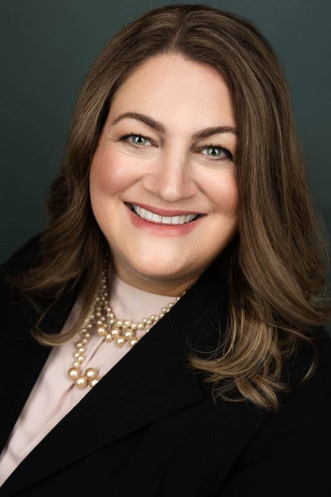 Jennifer Wright, Attorney at Wright Law Firm, smiling in a professional portrait.